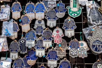 Hamsa with "Chai" symbol - "Living" sale at Carmel Market, popular marketplace in Tel-Aviv. Israel
