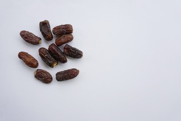 Dried dates isolated on white background