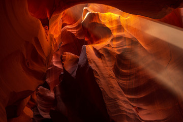 Upper Antelope Slot Canyon showing a light beam into the canyon.