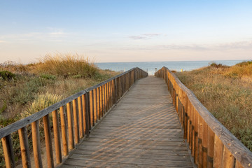 Obraz premium sunrise at the beach in Andalusia, spain with dune