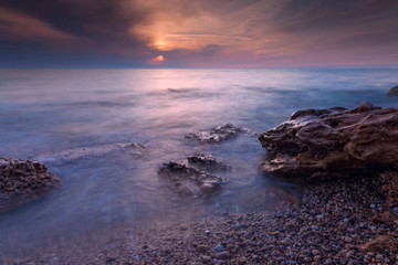 Disturbing sea sunset