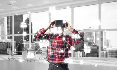 Guy wearing checked shirt and virtual mask demonstrating some emotions