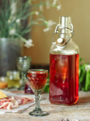 liqueur in a glass on a wooden table (wine) - (celebration) - drink cuisine.  Food background