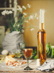 liqueur in a glass on a wooden table (wine) - (celebration) - drink cuisine.  Food background