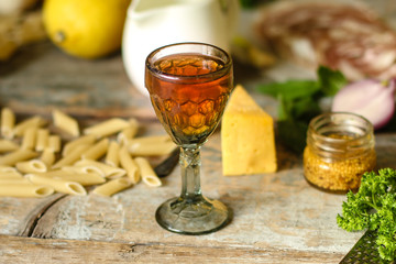 liqueur in a glass on a wooden table (wine) - (celebration) - drink cuisine.  Food background