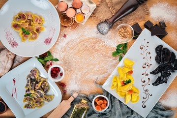Vareniks. Ukrainian Traditional Cuisine. Top view. On a wooden background. Copy space.