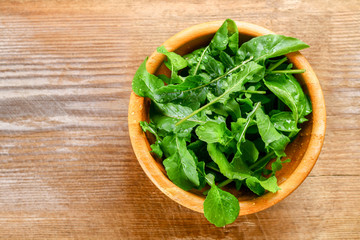 Fresh green home arugula leaves, rucola. Salad.