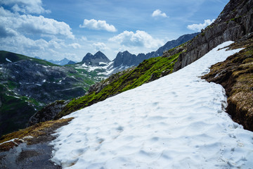 Snowmelting. Mountain landscape of the alps. Lech, Austria