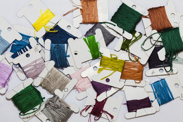 coils with colored thread