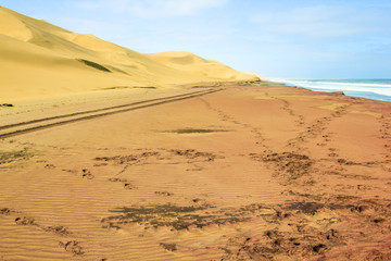 Sandwich Harbour, Walvis Bay, is a part of the Namib Naukluft Park Namibia. Wild and remote area accessible only by off-road. .