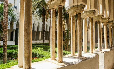 "Paradise Yard" is patio with gallery with pointed carved arches, adjacent to Cathedral of St. Andrew in Amalfi