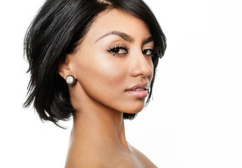 Beautiful women's face with short hair and dark exotic features. - obrazy, fototapety, plakaty
