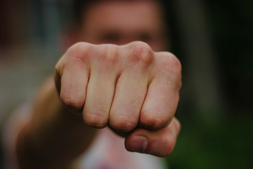 The fist of an aggressive person