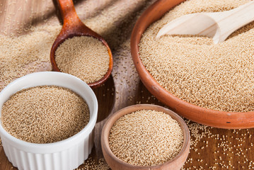 Raw Organic Amaranth grain on wooden table