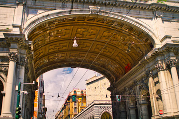 Fototapeta premium Large archway over intersection in Genoa, Italy