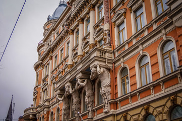 Old houses and red facades in the streets of Helsinki, Finland