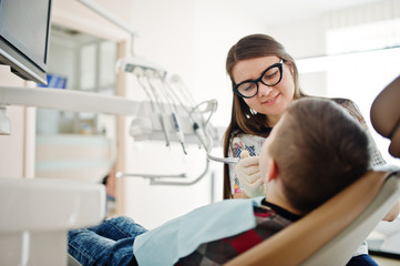 Little boy at dentist chair. Children dental.