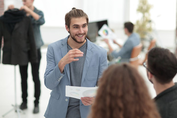 successful team of designers working in the office.