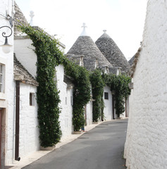 Alberobello, Puglia Region, South of Italy. Trulli di Alberobello.  Traditional roofs of the...