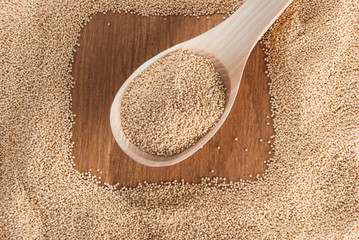 Raw Organic Amaranth grain on wooden table