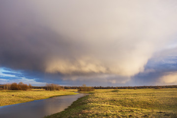 Fototapeta na wymiar Cloud over Bogolyubovsky meadow, Vladimir region. Russian landscape