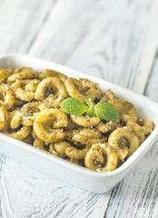 Bowl of pasta with pesto sauce
