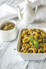 Bowl of pasta with pesto sauce