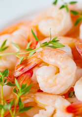 boiled shrimps on wooden surface