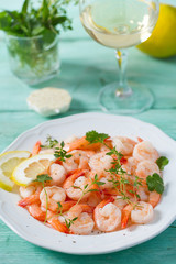boiled shrimps on wooden surface
