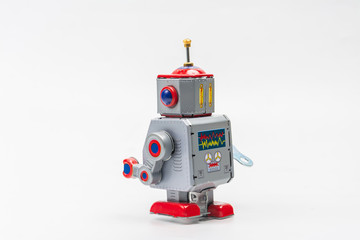 Fototapeta premium robot tin toy on white background