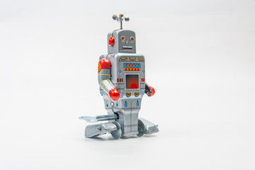 robot tin toy on white background