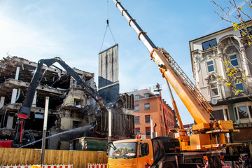 Orange Crane and demolition bulldozer