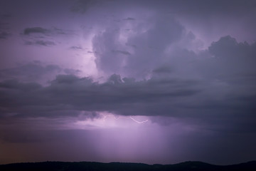 Thick thundercloud in sky