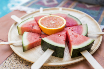 A dish of sliced watermelons