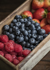 Closeup of fresh bluberries and raspberries