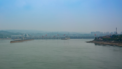 Fototapeta na wymiar Distant view of the Three Gorges Dam over Yangtze river in Yichang China