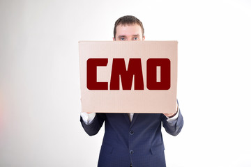 The businessman is holding a box with the inscription:CMO
