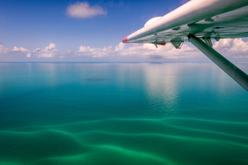 Naklejka na ściany i meble Flying over the Caribbean Sea