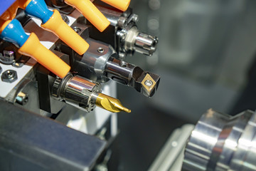 Close-up of the  CNC lathe machine or turning machine with the cutting tool,drill tool.The high...