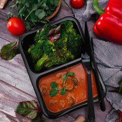 Close-up view of tasty goulash with broccoli