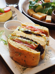 Sandwich with fresh smoked chicken, cheese and lettuce 