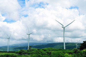 wind power plants against the background of mountains. Green energy. Ecology