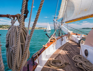 Obraz premium On the Deck of a Sailboat