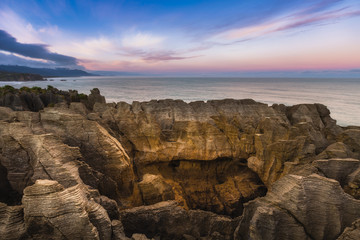 Pancake rock with beatiful sky, This is famous landmark in Punakaiki New Zealand.