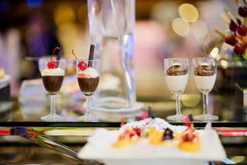 Glass shots pastry, wedding catering food, mini canapes food, tasty dessert, Beautiful decorate catering banquet table,  snacks and appetizers, wedding celebration