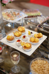 Glass shots pastry, wedding catering food, mini canapes food, tasty dessert, Beautiful decorate catering banquet table,  snacks and appetizers, wedding celebration