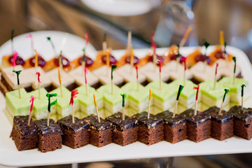 Glass shots pastry, wedding catering food, mini canapes food, tasty dessert, Beautiful decorate catering banquet table,  snacks and appetizers, wedding celebration