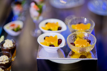 Glass shots pastry, wedding catering food, mini canapes food, tasty dessert, Beautiful decorate catering banquet table,  snacks and appetizers, wedding celebration