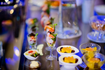 Glass shots pastry, wedding catering food, mini canapes food, tasty dessert, Beautiful decorate catering banquet table,  snacks and appetizers, wedding celebration
