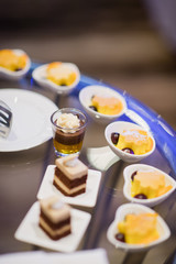 Glass shots pastry, wedding catering food, mini canapes food, tasty dessert, Beautiful decorate catering banquet table,  snacks and appetizers, wedding celebration